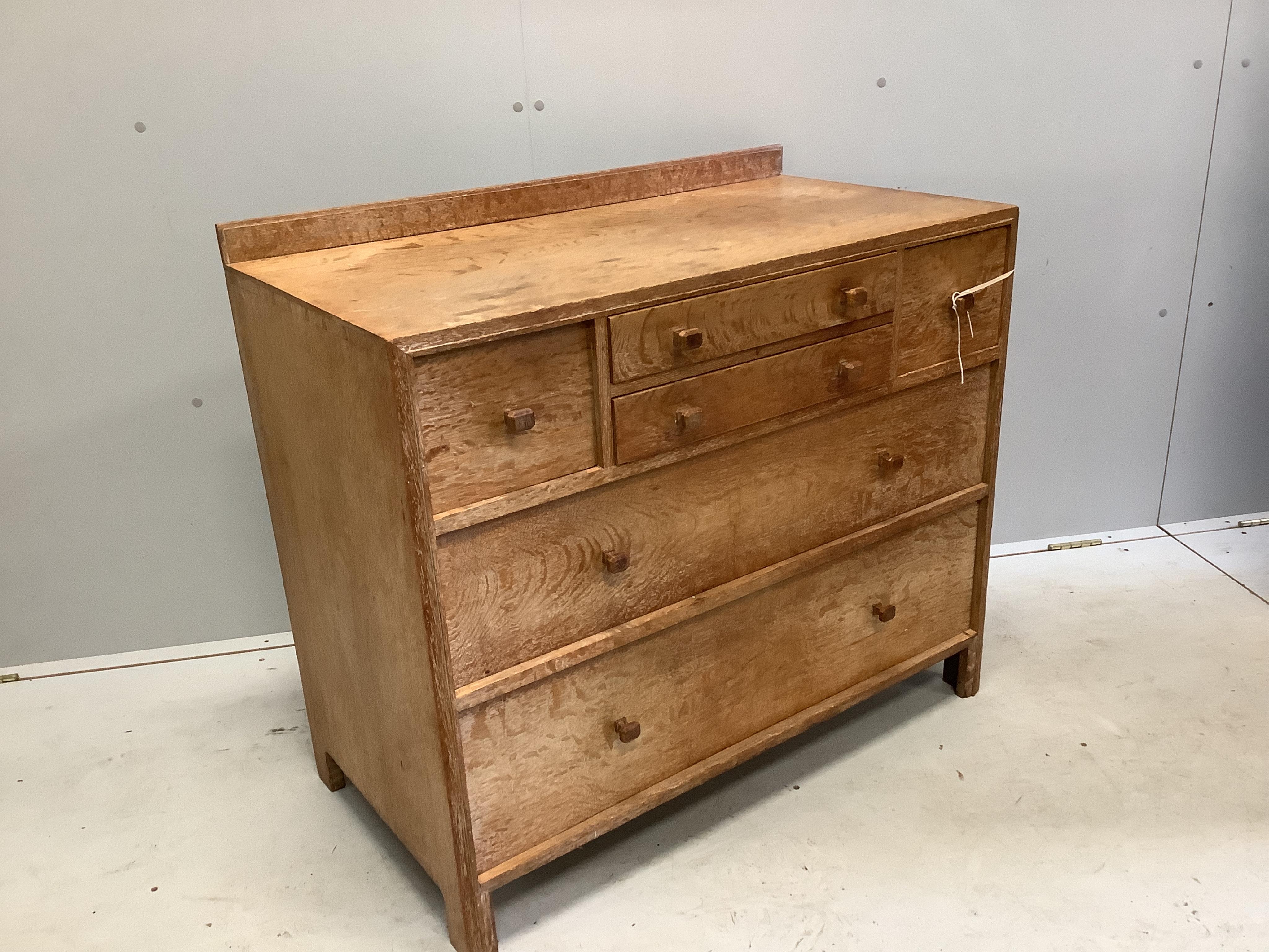 Heal & Son Ltd. A weathered oak six drawer chest, width 91cm, depth 47cm, height 80cm, and a triple dressing table mirror. Condition - fair